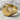 Broken Signet Ring, gold vermeil, angled product photo on stone