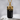 Raw Black Tourmaline Pendant, gold vermeil, product photo on stone