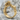 Lesbian Couple Ring, gold vermeil, angled product photo on stone
