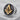 Masonic Letter G Lapel Pin, two-tone, product photo on stone
