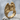 Weeping Angel Ring, gold vermeil, front view on stone surface