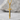 Vivere Militare Est Sword Pendant, gold vermeil, product photo on stone