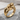 Women Embracing Ring, gold vermeil, front product photo on stone