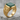 Phoenix Green Agate Signet Ring, three-quarter view on stone pedestal