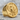 Yatagarasu Signet Ring, gold vermeil, angled product photo on stone