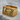 Built Not Born Dumbbell Ring, gold vermeil, product photo on stone surface