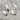Cracked Garnet Earring, polished, pair display on stone surface