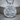 Holy Trinity Pendant, polished silver, front view on wood