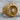 Jet Engine Turbine Ring, gold vermeil, product photo on wood surface