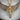 Lorraine Cross Pendant, gold vermeil, resting on wood block