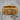 Royal skull ring, gold vermeil, front product view on wood