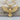 Spread Wing Eagle Pendant, gold vermeil, front view on wood base