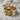 Molten Wave Ring, gold vermeil, product photo on stone