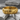 Dragon and Phoenix Band Ring in gold vermeil, angled view on stone