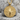 Compass Rose Pendant, gold vermeil, front view on stone