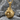 Championship belt boxing speedbag pendant, gold vermeil, front view on stone