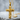 Layered Cross Pendant, gold vermeil, product photo on stone