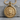 Lion Medallion Pendant, gold vermeil, product photo on stone