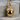 Oak Acorn Pendant, gold vermeil, product photo on wood block