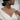 Coiled Fox Pendant, rose gold, worn on model around the neck