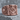 Masonic Temple Ring, rose gold plated, angled front view on stone