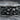 Catacomb Skull Band Ring, oxidized silver, close-up of sculpted skull relief