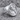 Good Shepherd Cross Ring, polished silver, angled product photo on stone