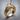 Flying Eagle Ring, gold vermeil, product photo on wood surface