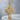 Knotwork Celtic Cross Pendant, gold vermeil, front view on stone block