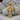 Three Bar Orthodox Cross Pendant, gold vermeil, product photo on stone