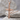 Rope Bound Cross Pendant, rose gold, product photo on stone