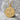 Saint Benedict Medal Pendant, gold vermeil, front view on stone