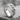 Chain spinner ring, polished silver, product photo on stone