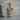 Slithering Snake Pendant, gold vermeil, product photo on stone