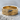 Raw texture band ring, gold vermeil finish, product view on stone