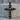 Multi skull cross pendant, black rhodium, front product view on concrete