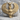 Winged Bastet Pendant, gold vermeil, front view resting on stone
