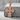 Orthodox Saints Cross Pendant, rose gold, product photo resting on stone
