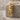 Panther Sword Pendant, gold vermeil, product photo on stone