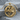 Rearing Dragon Pendant, gold vermeil, product photo on stone surface