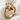 Anatomical Heart Ring in gold vermeil, angled product photo on fabric