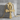 Egyptian ankh cross pendant, gold vermeil, front view on concrete block