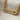 Horizontal Safety Pin Pendant, gold vermeil, laying on fabric