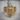 Royal Cross Ring, gold vermeil, front view on wood surface
