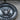 Extreme close-up view of handcrafted US Navy pendant highlighting eagle shield details and oxidized finish