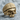 Knit Beanie Skull Ring, gold vermeil, product photo on stone surface