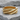 Hexagonal Spiral Ring, gold vermeil, front product photo on stone