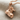Work Boot Pendant, rose gold, product photo on woven linen fabric