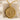 Garden Skeleton Pendant, gold vermeil, product photo resting on marble block
