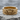 Spread Wings Skull Ring, gold vermeil, product photo on stone